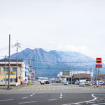 View of Sakurajima from an intersection near Kagoshima Fish Market.