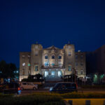 Kagoshima Chuo Public Hall at night, showcasing Japanese modern architecture