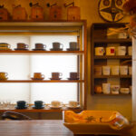 Warm and quiet interior of &COFFEE, creating a calm and cozy atmosphere