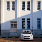 Afternoon sunlight and shadows over regular windows