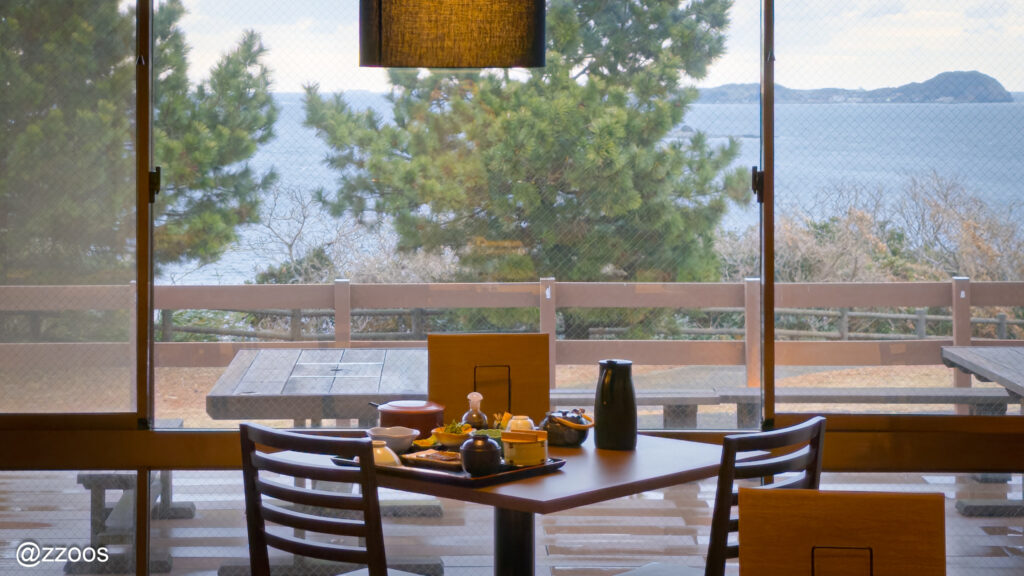 Breakfast set before a sea view