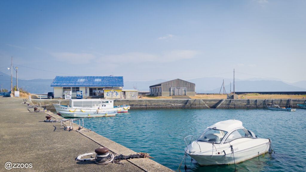 Boats docked at the harbor and the village scenery