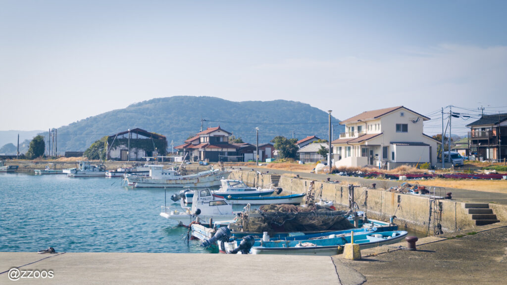 Boats docked at the harbor and the village scenery
