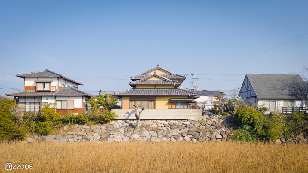 Two-story houses lined up across the moat