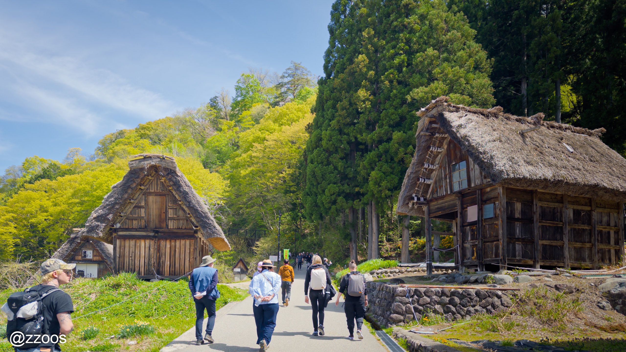 Tourists climbing the path up to the Ogimachi Castle Site Observatory