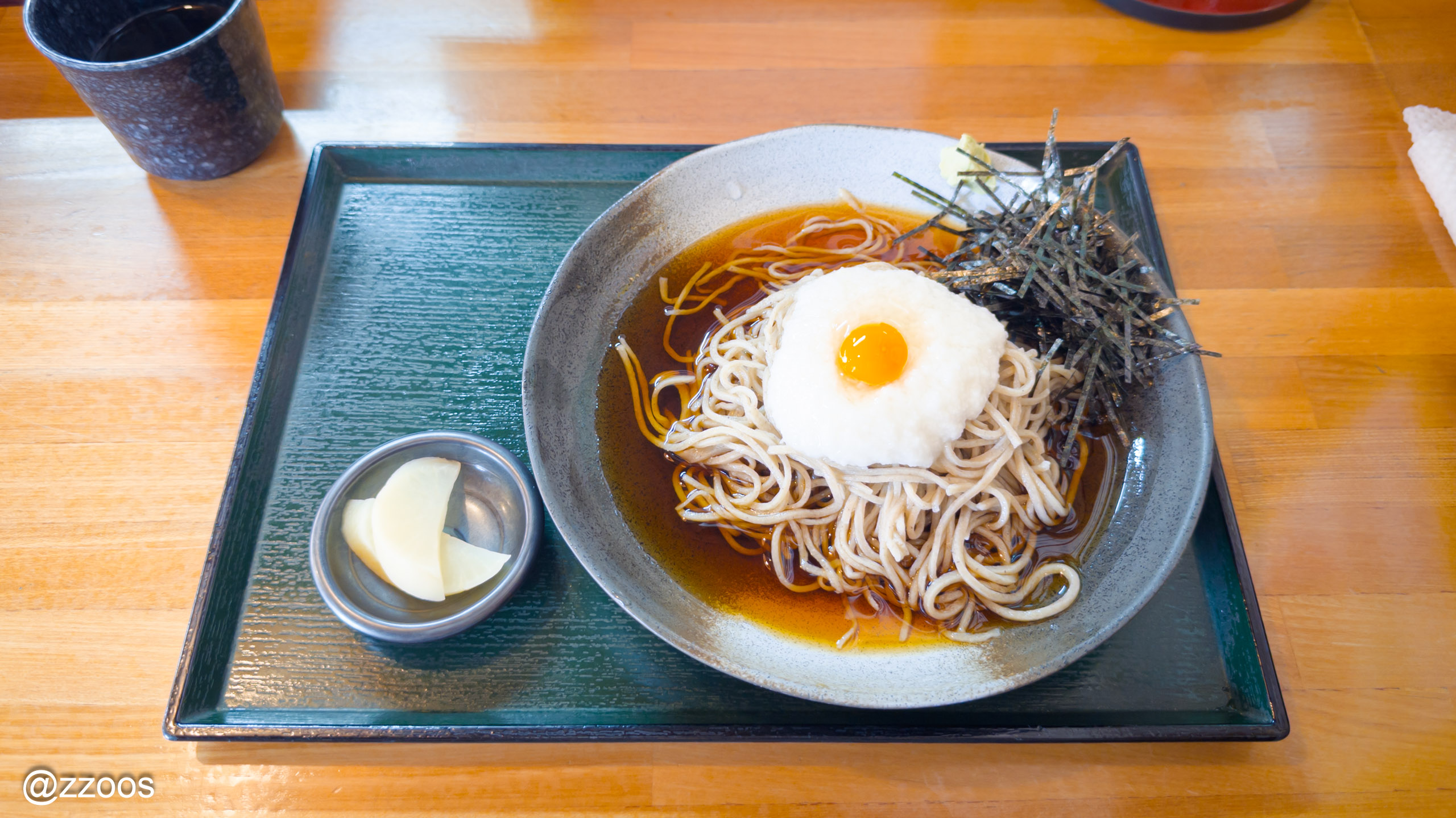 A bowl of cold tororo soba topped with grated yam