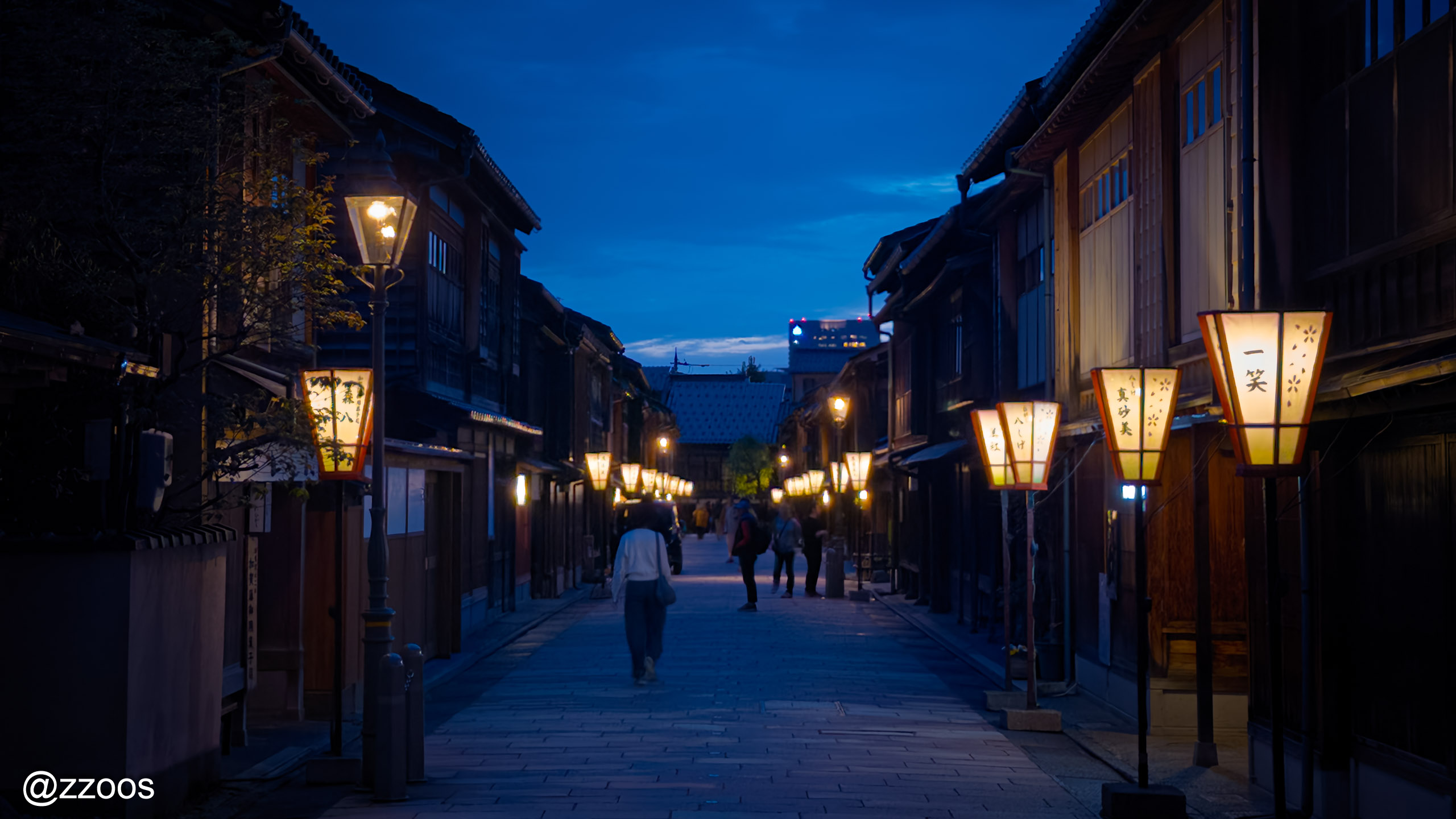 Higashi Chaya at dusk with the street lamps lit