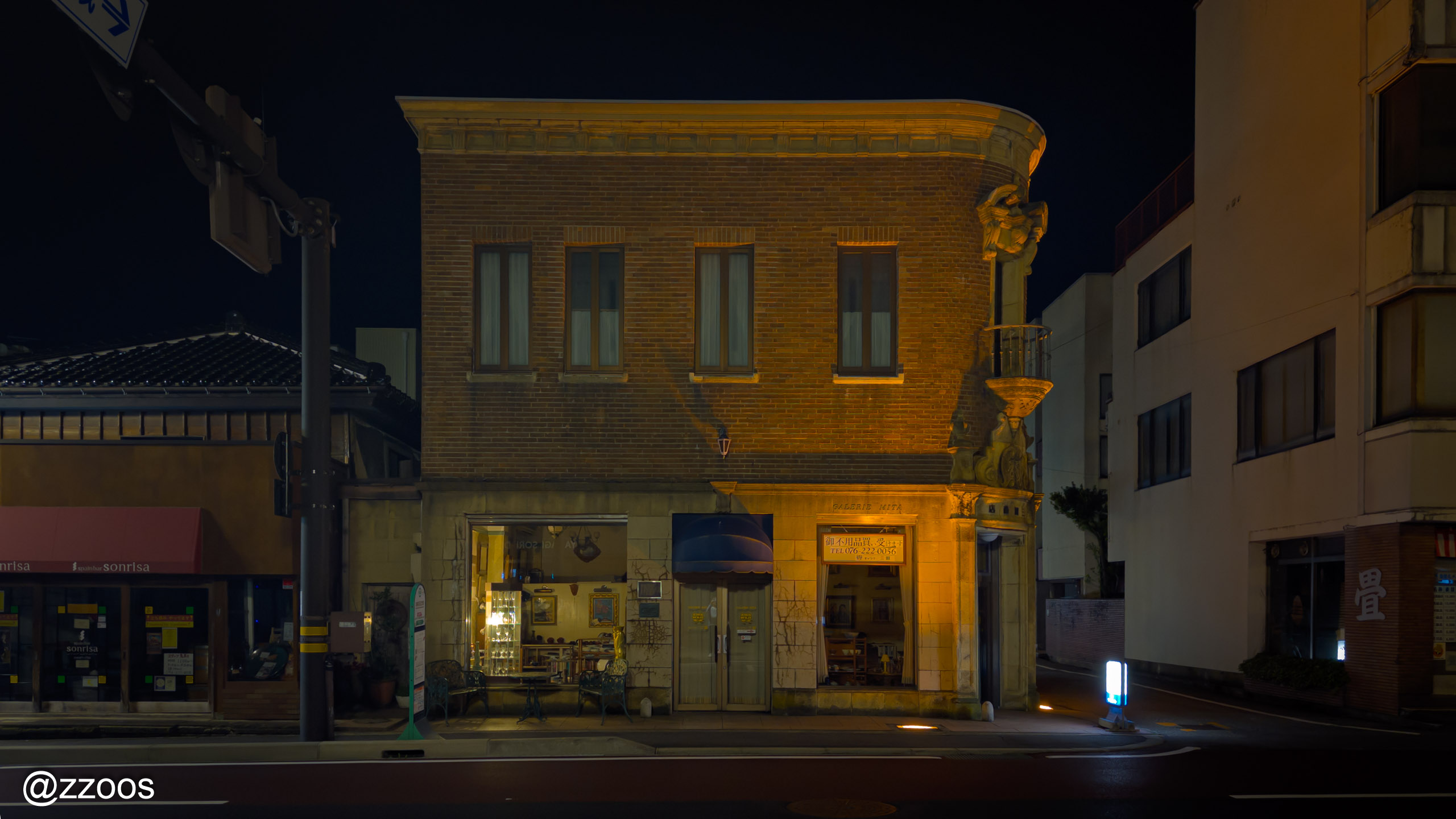 A European-style building housing a gallery and shops
