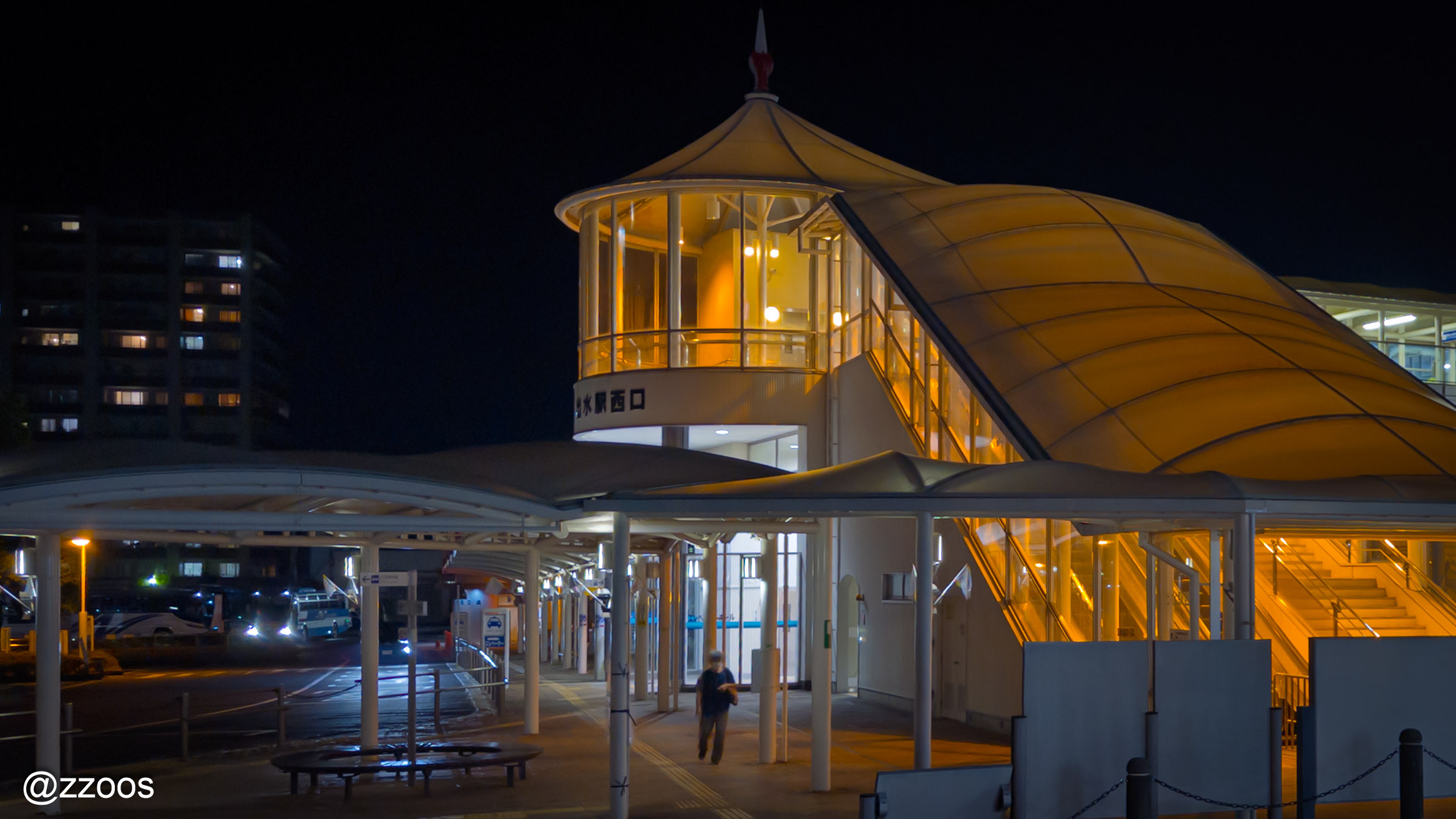 The west exit of Izumi Station at night