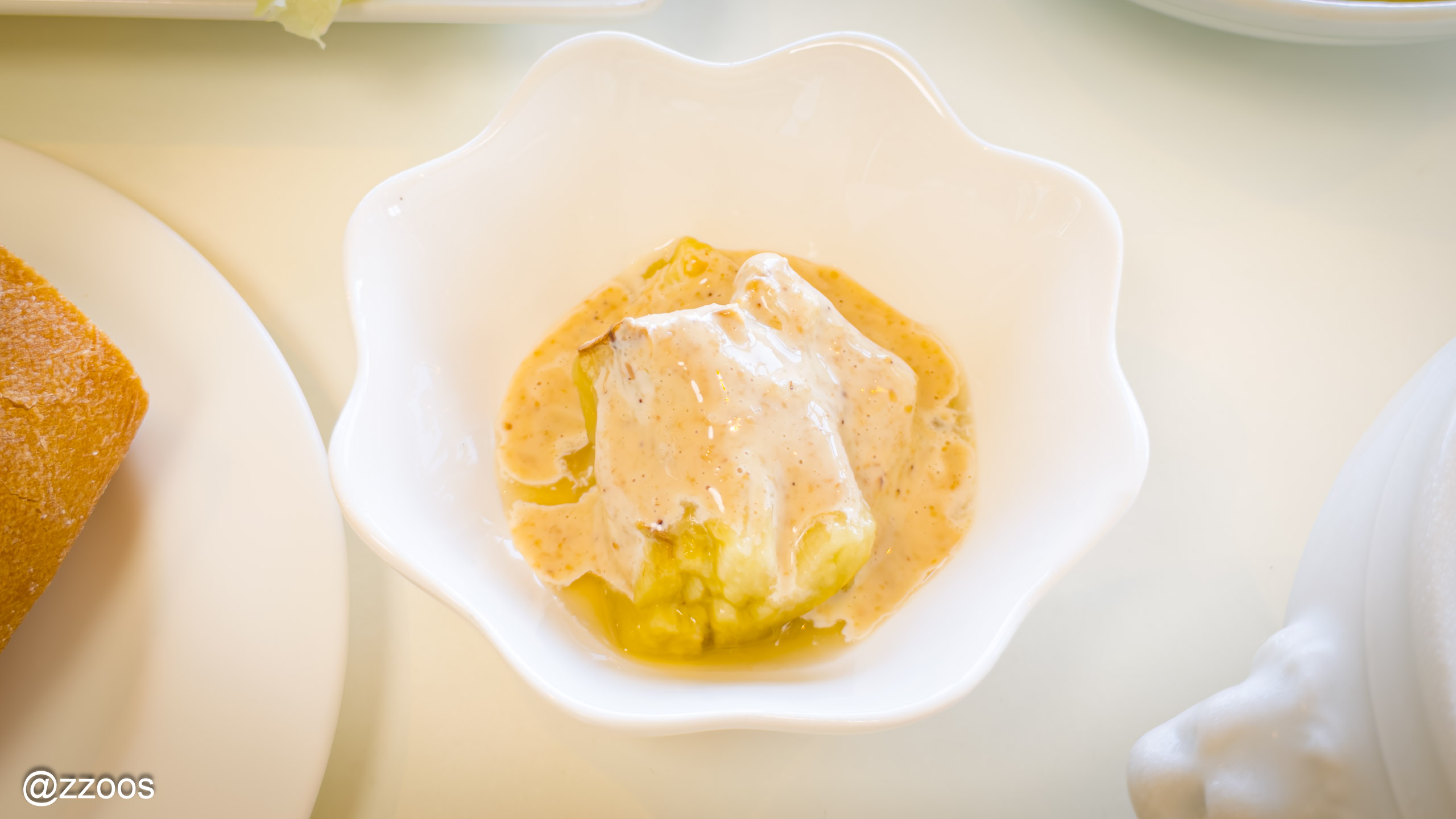 An eggplant dish topped with sesame dressing