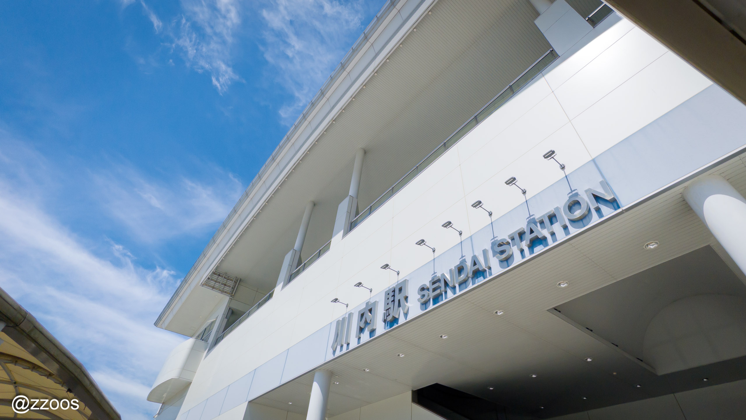 Station name sign in front of Sendai Station