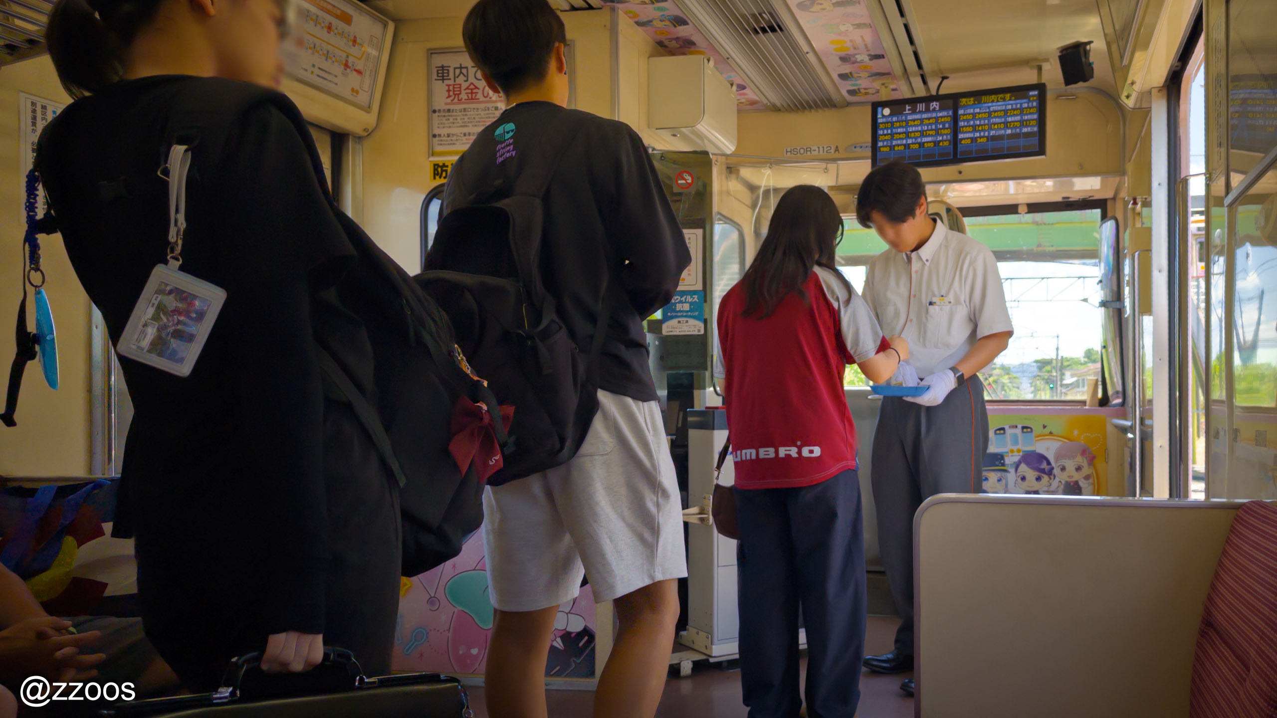 Local residents using a Hisatsu Orange Railway train