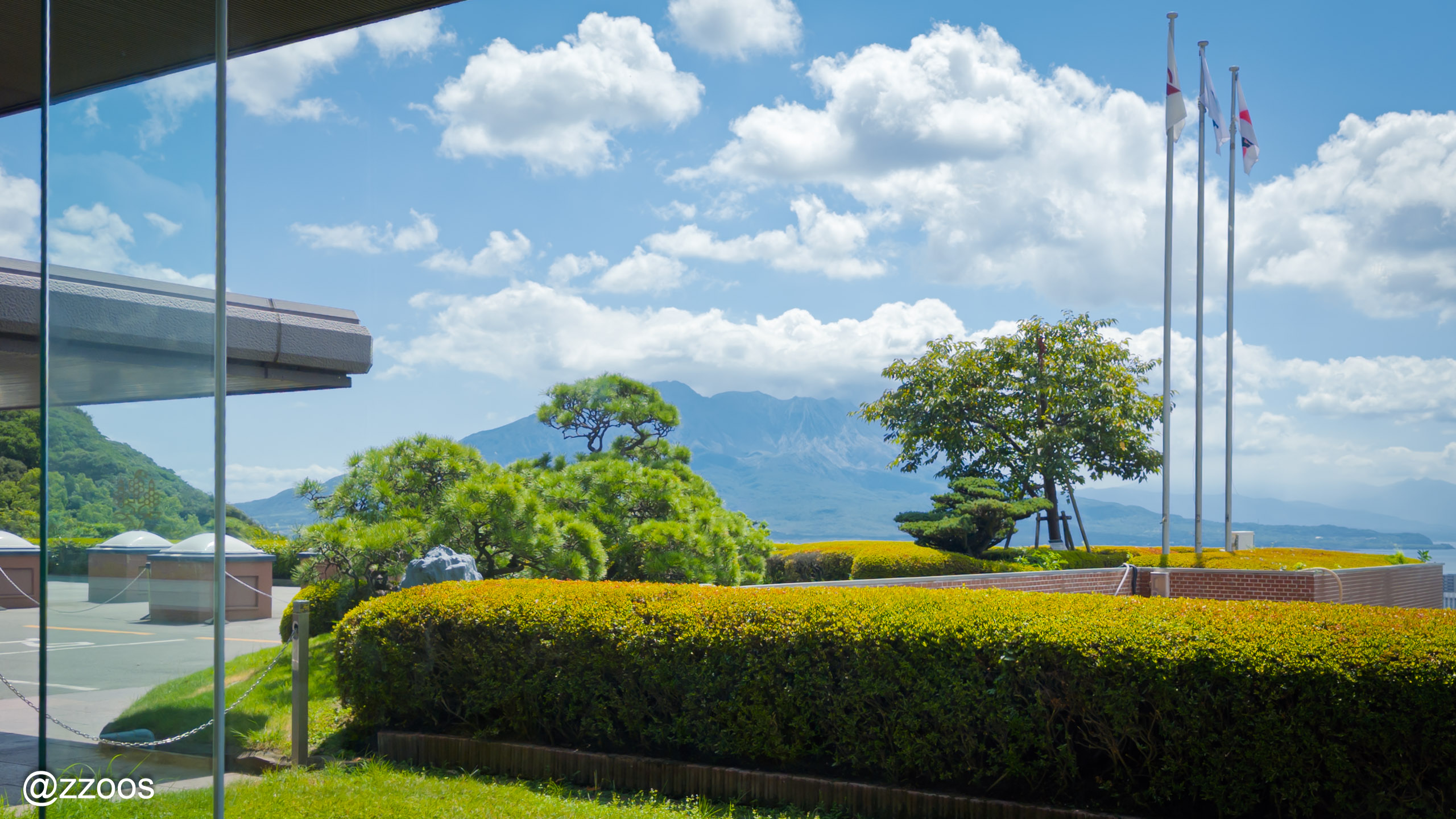 Sakurajima seen through the lobby windows of Shiroyama Hotel