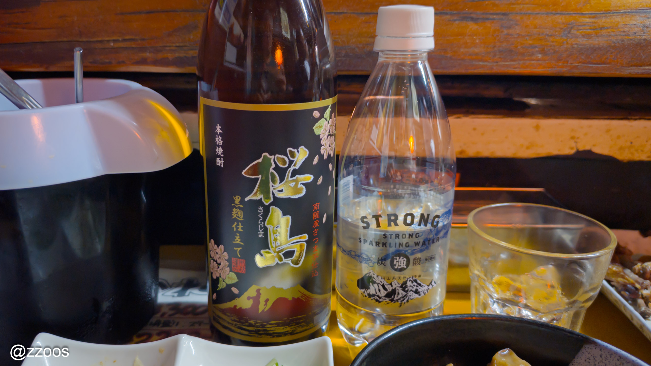 A bottle of Sakurajima, a black koji sweet potato shochu